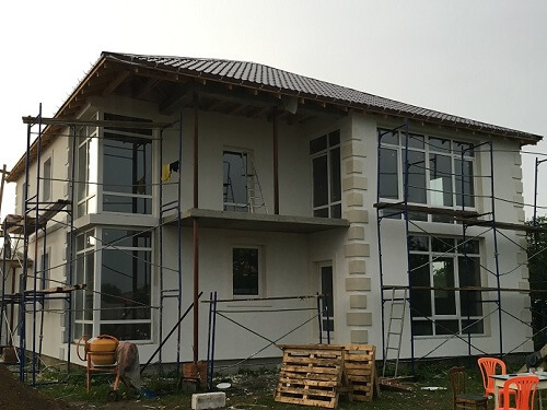 Отделка фасада дома штукатуркой в Логойске